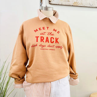 Beige sweatshirt with red text 'Meet Me at the Track - Dark Days Don't Applu text. Saratoga Springs, NY Boutique